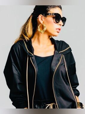 Champion Black Jacket with Gold Accents